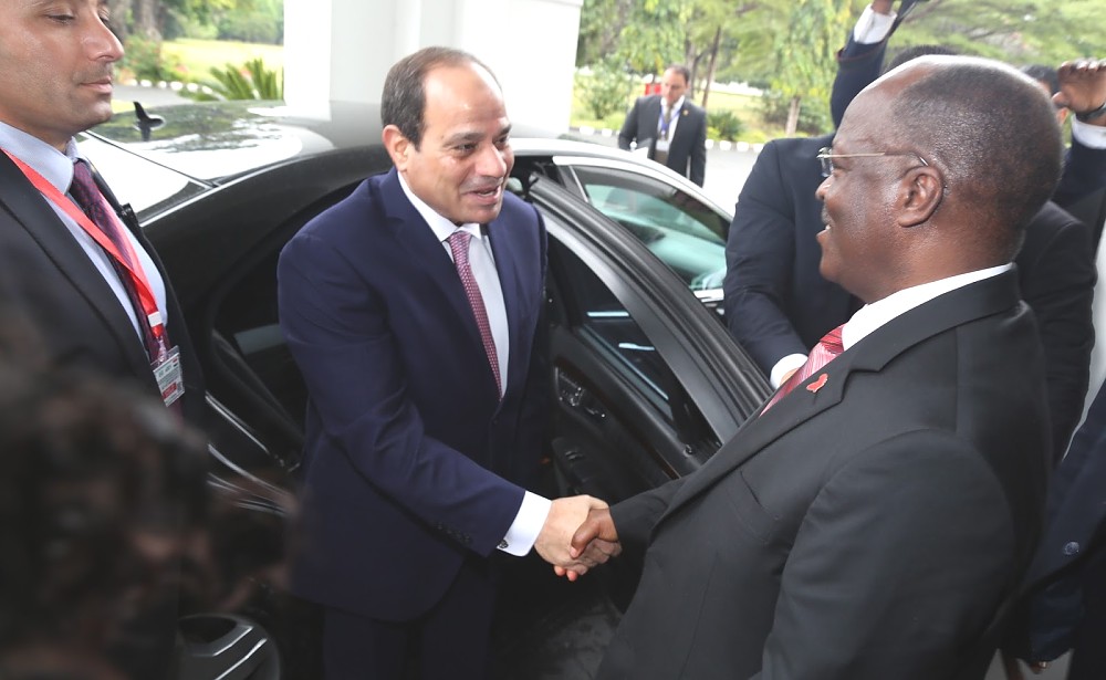 President Dr. John Pombe Magufuli walks welcomes to the state House his  guest Egyptian President Abdel Fattah El-Sisi